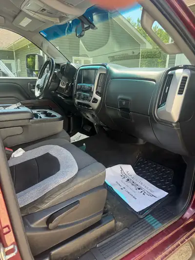 This vehicle has minor scratches and dents on the outside as well as minor rust at the door handle....