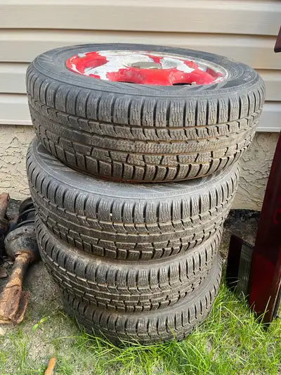 195/60/R15 Nokian Tires, 5x100 Subaru wheels 
