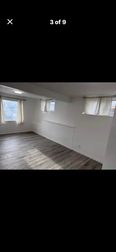 This bright, recently renovated walkout basement apartment features modern laminate flooring and lar...