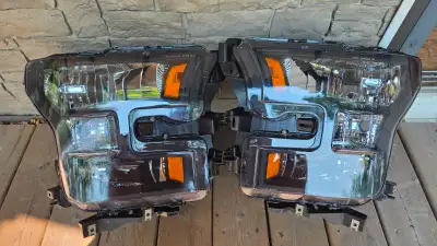 pair of black buckets, aftermarket headlights. were on the vehicle for a brief period of time. like...