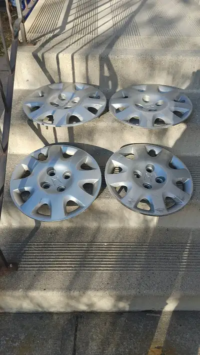 Three tires on original rims. One is a replacement tire with more tred on it. My old civic died last...
