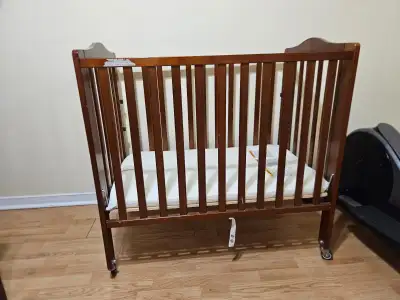 Portable foldable mini crib and mattress for Sale CA $120, View more