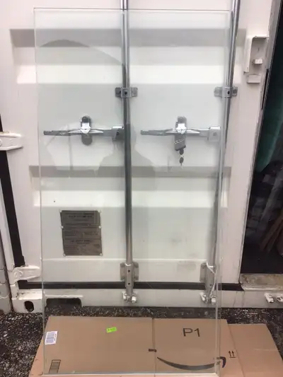 Door itself - 24-in x 72-in x 10mm - $250 side panel - 29-in x 58 1/2-in x 10mm - $250