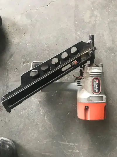 Paslode nailer with thousands of nails included.