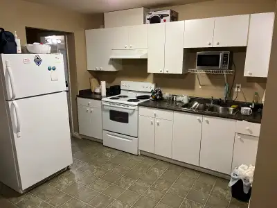 This clean and functional basement suite offers a comfortable living space with a well-equipped kitc...