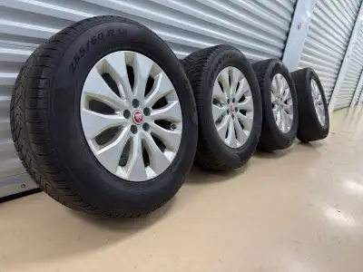 4 Jaguar rims in perfect condition with winter tires OEM Jaguar rims with sensors. Bolt pattern 5x10...