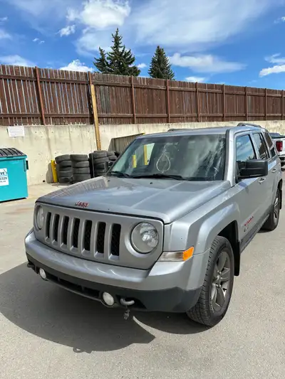 2016 Jeep Patriot almost all hi-way mileage needs a windshield good all weather tires and a few mino...