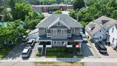 Large side by side duplex, 3 bedrooms each side, full baths up and 2 piece downstairs on both sides!...