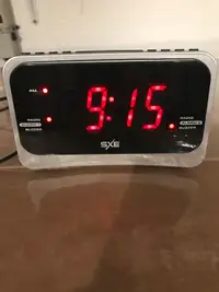 SXE Alarm Clock Radio with Adapter