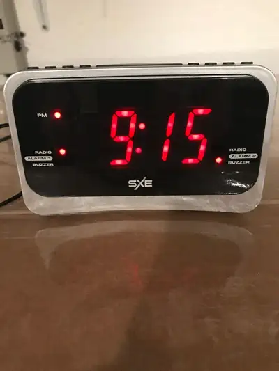 SXE Alarm Clock Radio with Adapter, View more