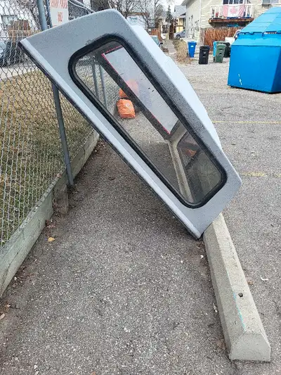 This is a used Big Steel truck cap, perfect for protecting your truck bed and gear from the elements...