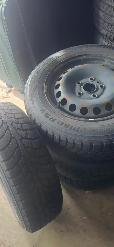 4 x Hankook iPike RSV 195/65R15 on 5x 114.3 mm bolt pattern steal rims WINTER TIRES ON RIMS 85% rubb...