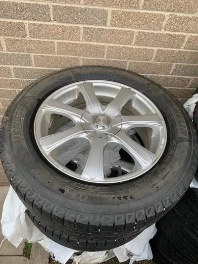 Set of 4 MICHELIN X snow tires In great condition come on RTX aluminum rims 235 /60 R17. Please call...
