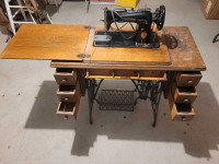 Sewing machine and cabinet 