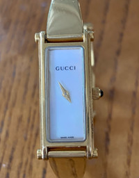 Montre Gucci pour  femme plaquée or 