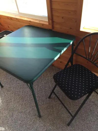 Foldable table and 4 chairs - no rips or tears, View more