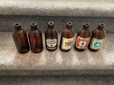 Vintage Beer Bottles. 4 have labels on them. 2 of them have no labels. $15 for the 6.