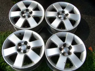 4 mags de corolla matrix oem de toyota 15 pouces 5x100 15x6 état général bon. on demande 350 ****mag...