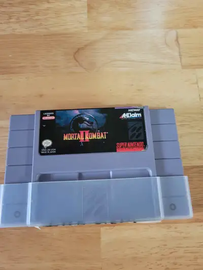 Mortal Kombat II (2) for Super Nintendo. No manual. DOES NOT come with the original card board box....