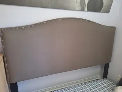 King size headboard $35 price to sell Dark Grey with metal rounded studs In good working condition s...