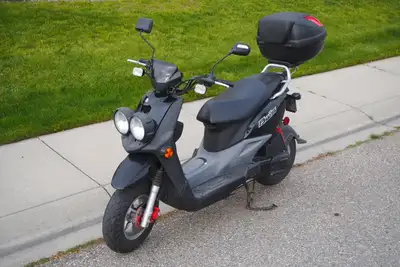 2012 Yamaha BWS 50 scooter. 8600 km. Registered in Alberta. Liquid-cooled, 49cc engine, fuel injecte...