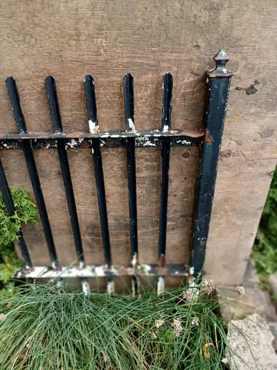This antique piece of wrought iron fence came from the Historical Chestnut Tree Building on the corn...