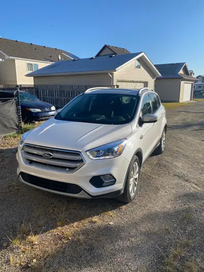 Selling my very well maintained Ford Escape. Kilometers are all highway kms as we live outside of Ca...