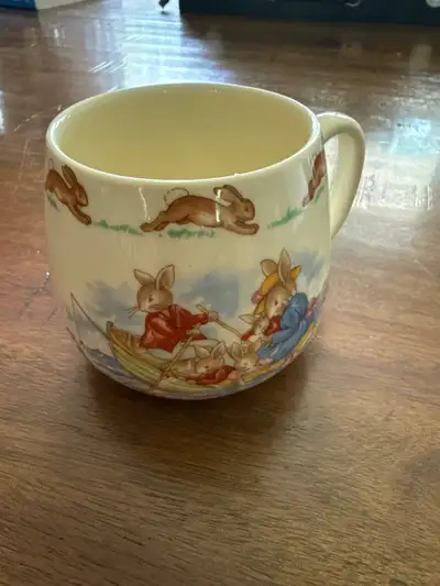 I am selling a Royal Doulton Bunnykins English fine bone china mug, perfect for collectors or as a c...