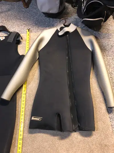 Oceaner farmer John style medium size wetsuit in great condition. Measurements while laying on the f...