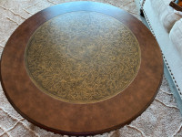 Round coffee table for sale. 100.00 or OBO.