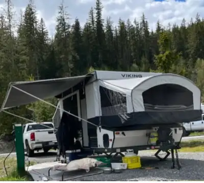 Has a large storage compartment at the front of the trailer. Hauls beautifully and sets up pretty ea...