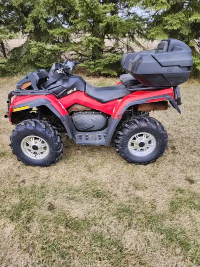 Can Am 800 Outlander for sale. c/w heated handle bars/thumb warmer, remote mounted radiator, factory...
