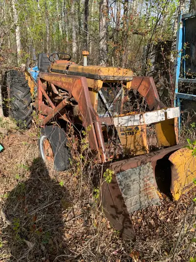 Has factory loader & rear hydraulic outlets Asking $1500 Call Don @ 780-305-3463