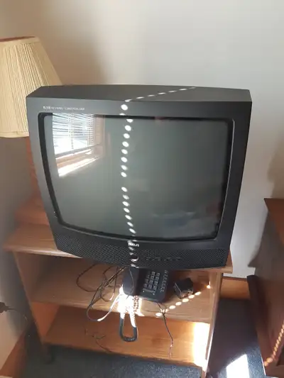 RCA TV & stand. comes with remote control. 20" been in my closet for 20 years!!