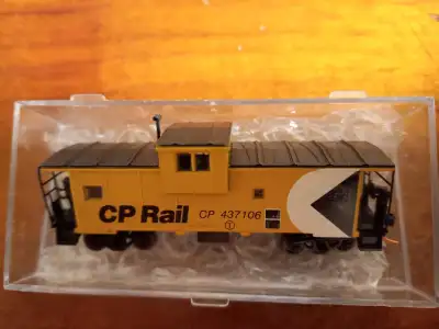 Comes with body mounted Micro Trains couplers. Shipping available. If ad is up it's available.