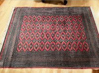 Monogrammed original Iranian fringed area rug