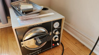 Autoclave/sterilizer with manuals, medical tools, and trays
