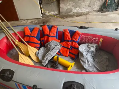 Two SEVLAR Inflatable Rafts, 2 Inflatable Seats, 4 Paddles, Pump & 3 Life Jackets. $250.00 Both raft...