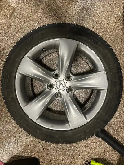Selling a full set of 18-inch Michelin X-Ice winter tires mounted on OEM Acura TL rims. Came off a 2...