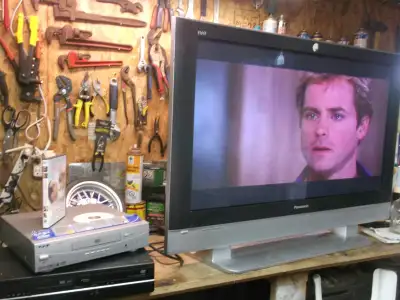 42" PANASONIC PLASMA TV  WITH FREE MOVIES AND DVD PLAYER, View more