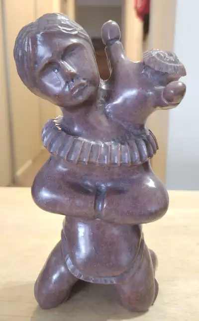 Inuit Carving of Mother and Child by Naulaq Inookie, View more