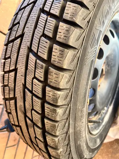 Selling set of 4 Yokohama IceGuard winter tire, size 215/70R16 100T, mounted on a steel rim. Only us...
