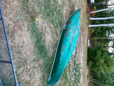 Fibreglass. Needs refinishing