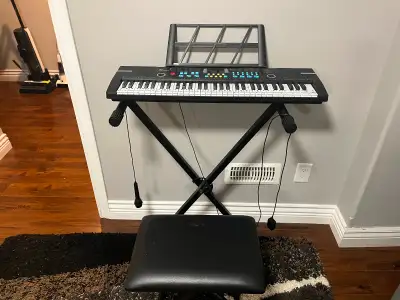 Piano with chair Excellent condition like new