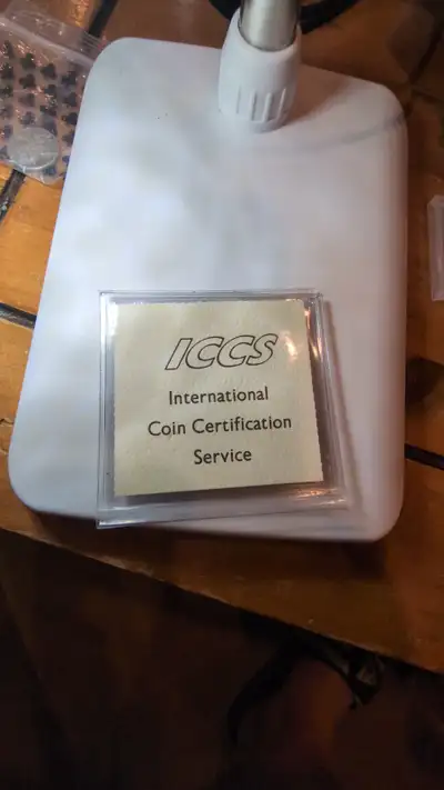 The coin was graded by ICCS MS-60. The 1936 Canadian silver dollar weighs 23.33 grams and is compose...