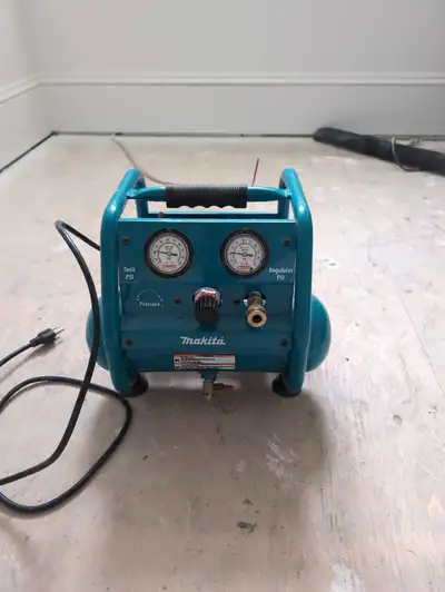 Quiet Makita compressor. Used lightly installing trim. 100$ obo.