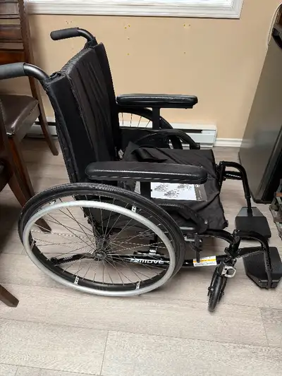 LIGHTWEIGHT MANUAL WHEELCHAIR 18" SEAT HEIGHT/ 18" SEAT DEPTH/ 18" SEAT TO FLOOR WHEELS/ 6" CASTERS...