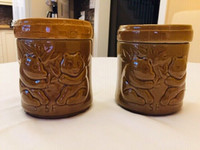 Pair of Rustic Panda Pottery Canisters