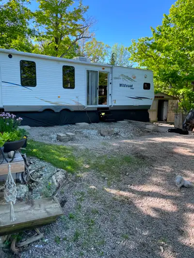 Water-view Spacious Campsite with 42’ park model trailer and out buildings for sale, ready to enjoy!...