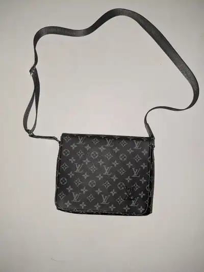 LV style messenger bag, barely used and in great shape. No damage, clean inside and out, zipper work...